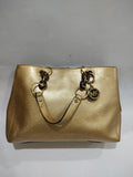 ✨ Radiant Metallic Gold Handbag with Tortoise Chain Detail ✨