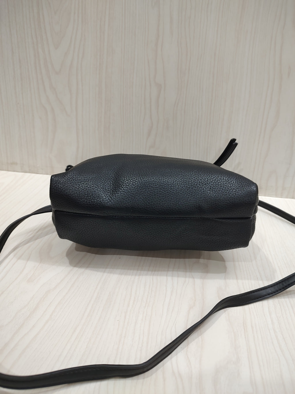 Sleek Textured Crossbody Bag with Triple-Compartment Storage