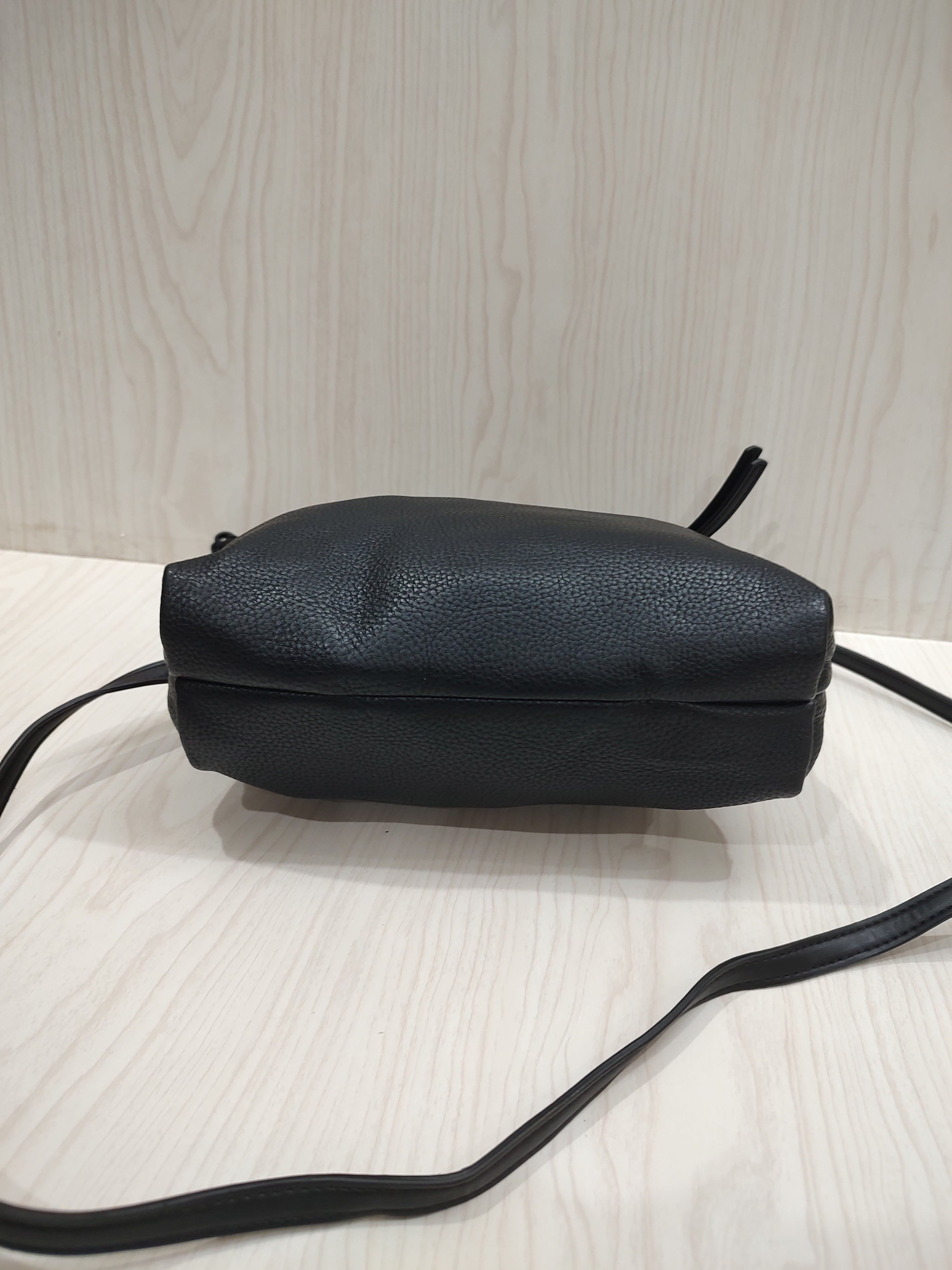 Sleek Textured Crossbody Bag with Triple-Compartment Storage