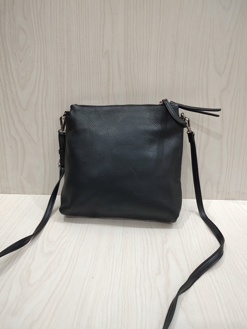 Sleek Textured Crossbody Bag with Triple-Compartment Storage