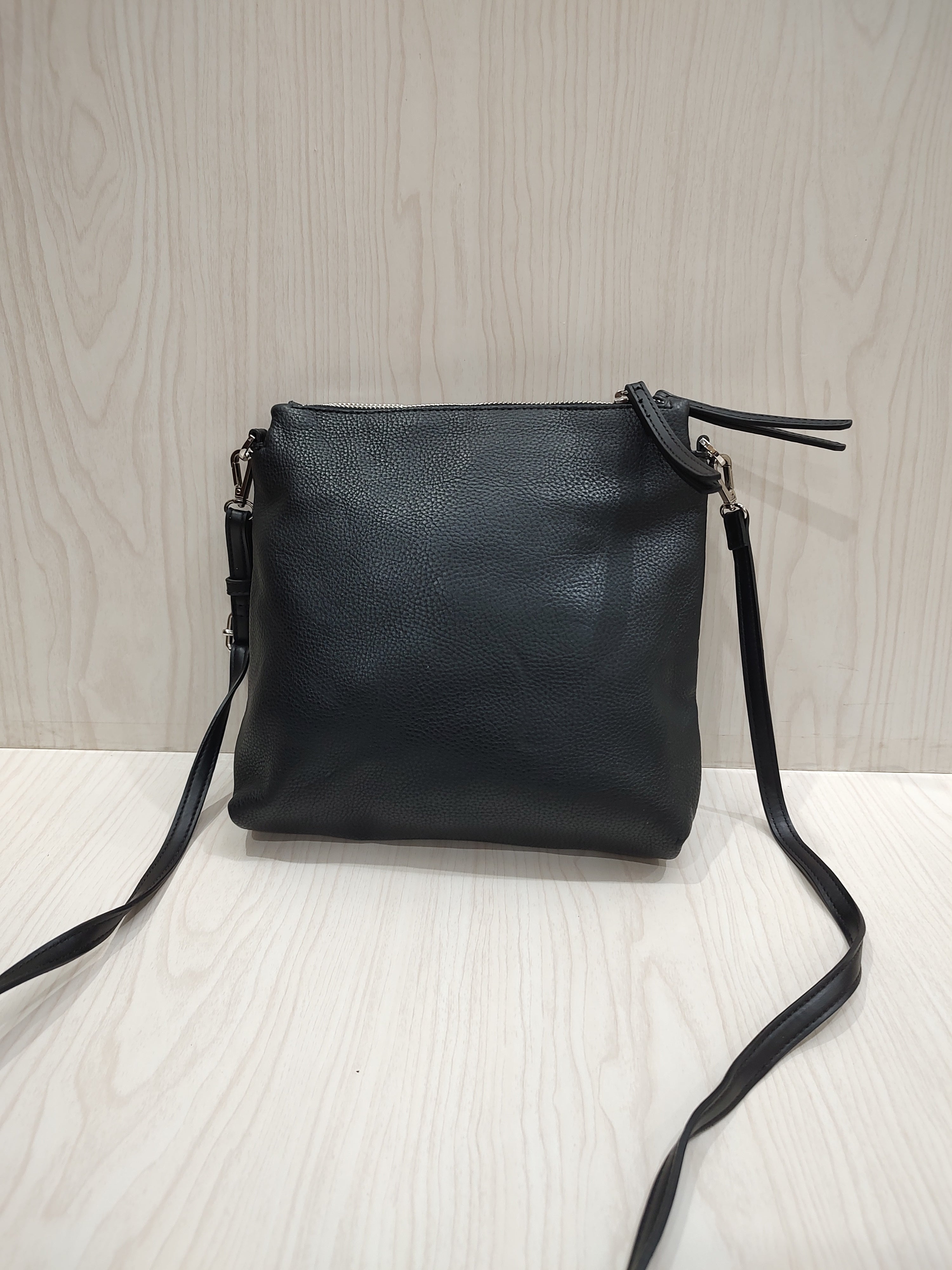 Sleek Textured Crossbody Bag with Triple-Compartment Storage